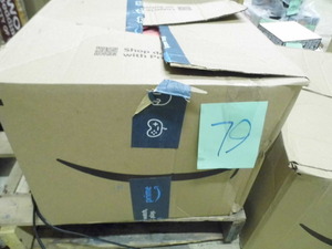 Box loaded with Dog clothing, harnesses, leashes and more