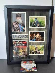 lot 106 image: Signed Authenticated Duck Dynasty Si Robertson Collage, signed. Professionally framed 