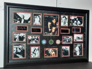 lot 88 image: Signed Casino Movie 35 x 23 Collage, Signed by the cast Robert DiNero, Sharon Stone, Jason Wood, Joe Pesci, 3 casino chips