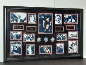 lot 77 image: Signed Casino Movie Photos in a &nbsp34 x 22 Collage with Poker Chips. Professionally framed 