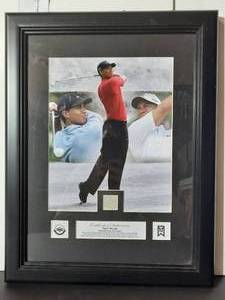 lot 68 image: Certified Tiger Woods PGA Collage. &nbspUpper Deck Certifies the swatch from a Nike Polo shirt is from one worn by Tiger in the tournament