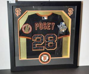 lot 55 image: Framed Shirt of Buster Posey San Francisco Giants MLB Winners of the World Series 2010