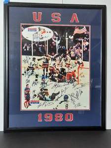 lot 21A image: Team Signed 1980 USA Wins Olympic Gold Metal in Hockey. Jim Craig with Old Glory, professionally framed.