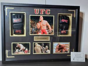 lot 39A image: Signed Authenticated&nbspphotos of Brock Lesnar UFC, framed.
