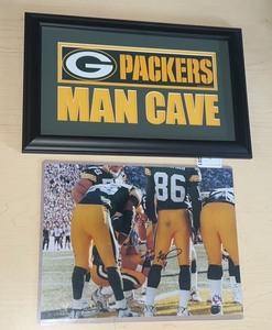 lot 201 image: Signed Authenticated Photo Brett Favre, Photo by John Stellmacher. Framed Packers Man Cave