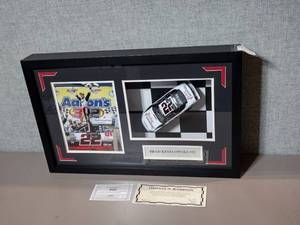 lot 59 image: Signed Authenticated limited edition 124 car replica and Photo of Brad Keselowski
