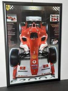 lot 211 image: Remembering Ferrari F2004, Formula One racing car used by Ferrari for the 2004 Formula One season, professionally framed