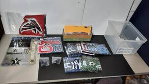 lot 243 image: Logo on the Gogo and other brand Team Decals and magnets
