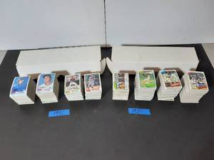 lot 300 image: 2 boxes of Baseball trading cards 1980 and 1982.