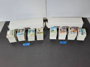 lot 322 image: 2 boxes of Baseball trading cards 1980 and 1982. Boxes measure approx 14.5 inches.