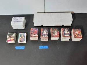 lot 324 image: Topps Basketball trading cards 1978 and 1979, box measures 4.5 1995 College Basketball trading cards, box measures 14.5