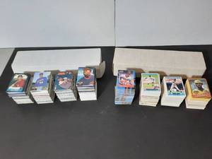 lot 326 image: 2 boxes of sports trading cards. Boxes are approx 15 inches.