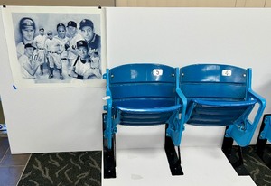 lot 27 image: 2 Authentic Yankee Stadium Seats and Signed Artwork on Canvas of Famous Yankee Players.