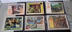 lot 375 image: Lobby Cards. Submarine Command Breakout Star of Texas Secret of Outlaw Flat The Rawhide Years Run Silent, Run Deep.