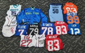 lot 379 image: 15) Sports Teams Jerseys