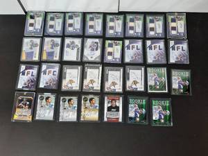 lot 60B image: (31) Viking Christian Ponder autographed cards, many are Rookie cards and all are encased in a protective covering.