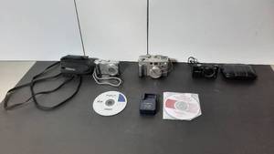 lot 374 image: Panasonic Camera  Canon Powershot G2 Digital Camera Samsung Wi-Fi enabled camera. Panasonic battery charger.