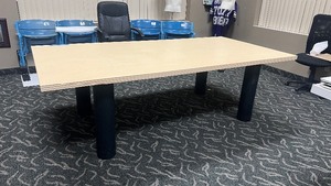 lot 222 image: Lacasse Conference Table with 4 metal tubular legs. Measures approx 95 L