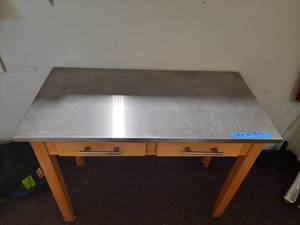 lot 246A image: Utility Table with 2 drawers and metal top. On wheels.