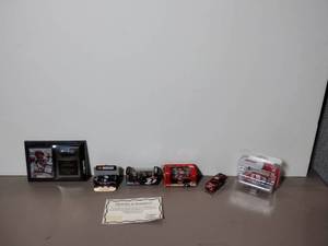 lot 482 image: Earnhardt Sr and Jr Limited Edition Replica cars and Photo collage.