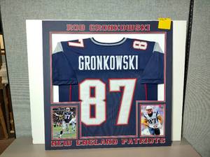 lot 216A image: Collage of Rob Gronkowski #87 Patriots Jersey and Photos, professionally matted. 32 x 32