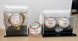 lot 499 image: 4 Baseballs 3 are in display cases. Twins Official League Baseballs. 1 Diamond Official League Baseball. 1 Signed Baseball