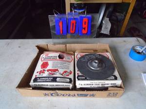Flat of sanding dics & grinder discs. As shown.
