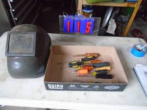 Flat of screwdrivers & welding helmet. As shown.