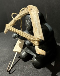 Inuit Figurine with Rawhide Hunting Bow