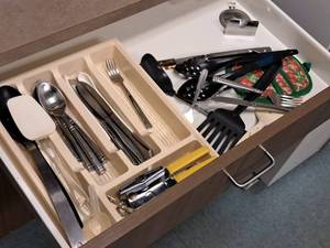 lot 104 image: Misc. Cooking Utensils - Knives, Forks, Spoons, Spatulas, Serving Spoons, Hot Pad Holder, Can Opener, Utensil Tray