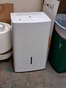 lot 134 image: G.E. 50-pint Humidifier ADEL50LWW1