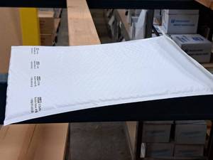 lot 229 image: Lot of (1 Partial Box) Uline #5 White Poly Bubble Mailers S-7548 16x10-12