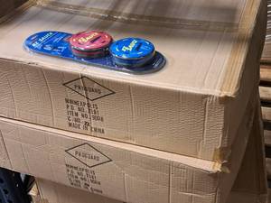lot 1077 image: Lot of (100) ProGuard EZ Sauce OnOff Ice Hockey Training Tool