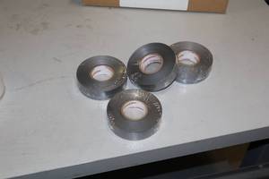 lot 1673 image: Lot of (8 Rolls) ProGuard Silver Hockey Tape 1x33yd