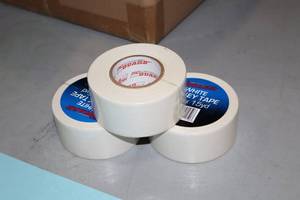 lot 1641 image: Lot of (12 Rolls) ProGuard White Hockey Tape 1-12x15yd