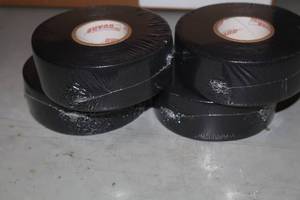 lot 1681 image: Lot of (20 Rolls) ProGuard Black Hockey Tape 1-12x30yd