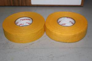 lot 1739 image: Lot of (18 Rolls) ProGuard Yellow Hockey Tape 1x27yd