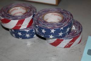 lot 1807 image: Lot of (25 Rolls) ProGuard USA Flag Hockey Tape 1x20yd