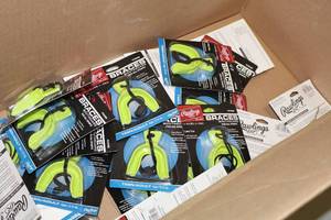 lot 2117 image: Lot of (20) Rawlings Size TeenAdult Braces Mouthguard