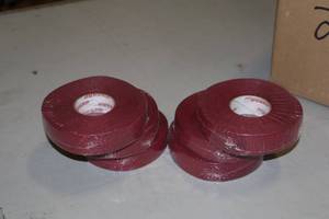 lot 1656 image: Lot of (12 Rolls) ProGuard Burgundy Hockey Tape 1x27yd