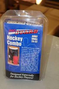 lot 2214 image: ProGuard Adult Small 26-32 Hockey Combo