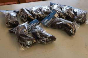 lot 2310 image: Lot of (10) ProGuard Premier Blade Mates Size Adult Ice Warehouse logo Hockey Skate Blade Guards