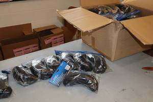 lot 2312 image: Lot of (25) ProGuard Premier Blade Mates Size Adult Ice Warehouse logo Hockey Skate Blade Guards