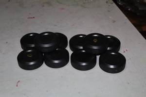 lot 2430 image: Lot of (10) 2-12 Plastic Practice Hockey Pucks