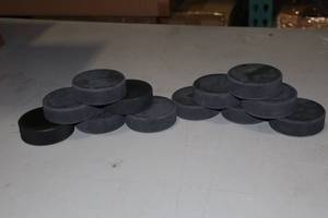 lot 2410 image: Lot of (50) Unprinted Hockey Pucks