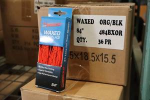lot 2725 image: Lot of (1 Box) ProGuard 84 Waxed OrangeBlack Hockey Lace Pairs 36-count ( 36 total items )