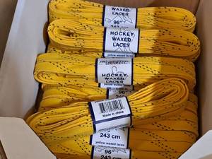 lot 3712 image: Lot of (13 Pairs) ProGuard 96 Waxed Yellow Hockey Laces