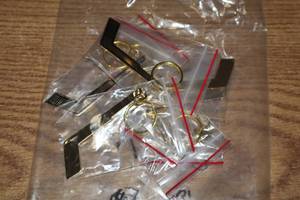 lot 3861 image: Lot of (8) Hockey Goalie Stick Keychains