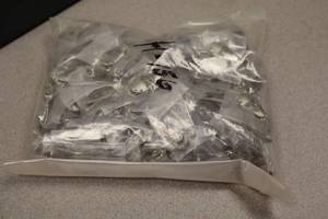 lot 3941 image: Lot of (150) Goalie Mask Pins