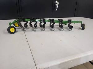 John Deere 6 Bottom Plow, Screw holding back Wheel On